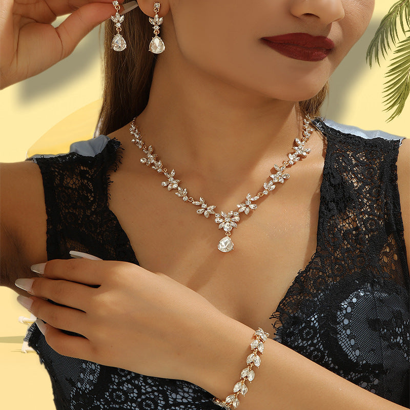 creative plum blossom necklace, earrings, and bracelet jewelry set - alloy, diamond-accented, bridal banquet dress, light luxury style