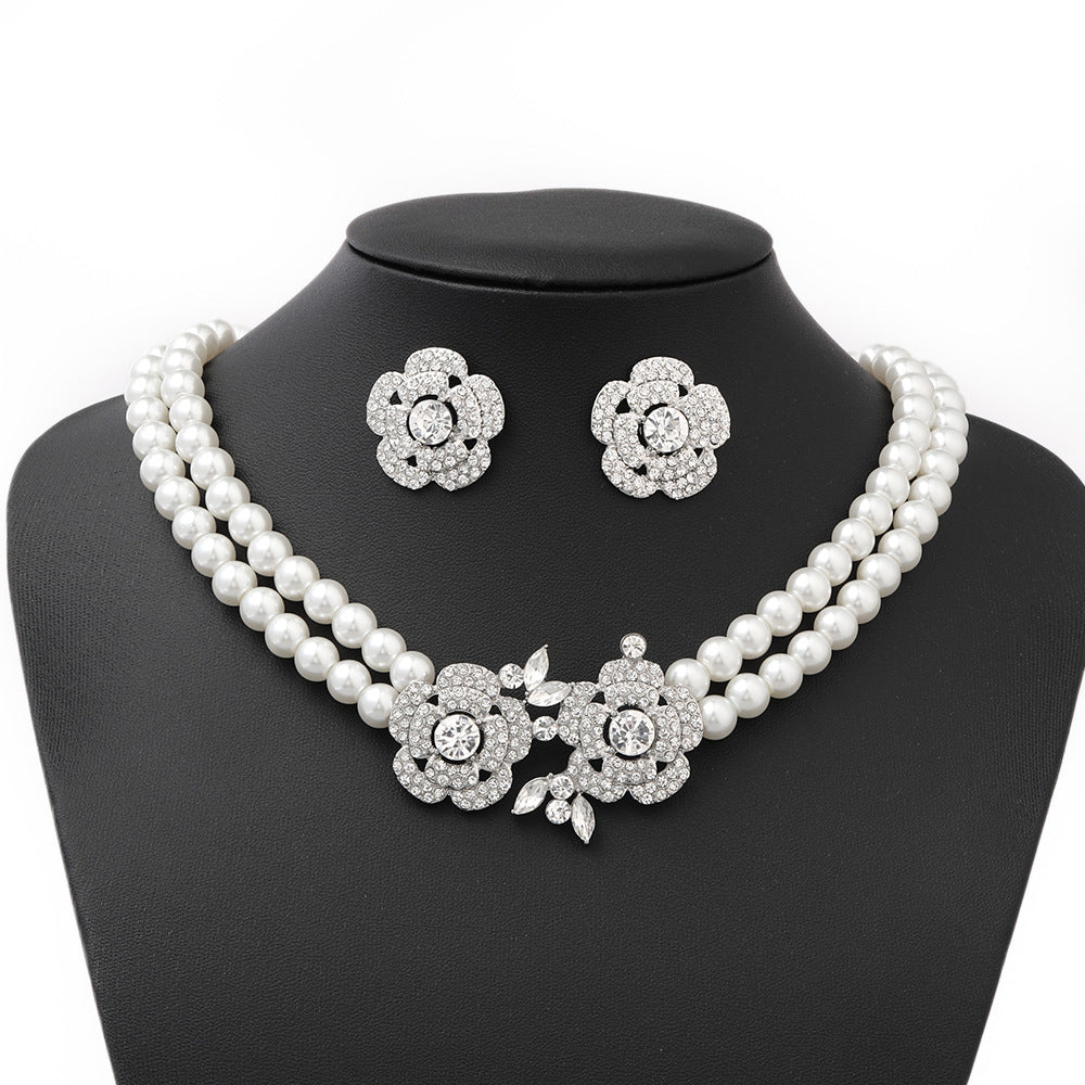 Diamond-studded floral faux pearl bracelet, earrings, and necklace set - fashionable, affordable luxury jewelry